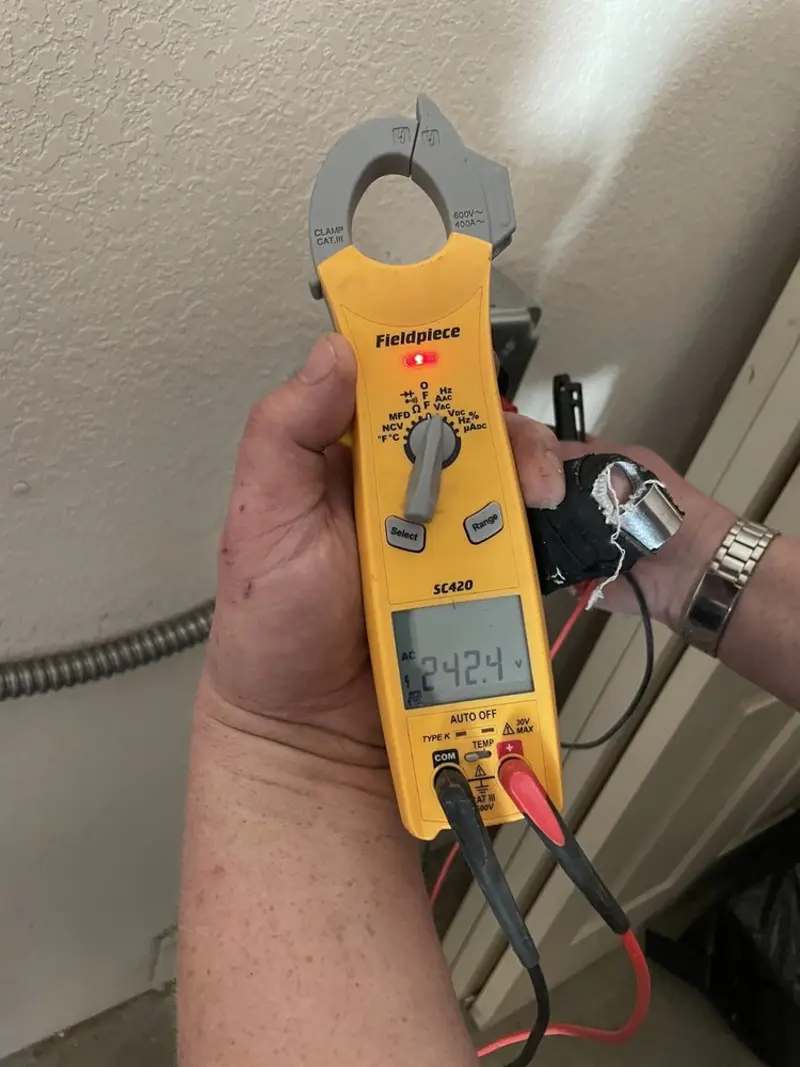 Voltage testing with clamp meter during Outlet Installation in Whiteford